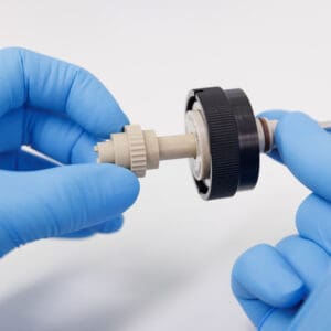 Scientist holding IonOpticks XS Installation Toolkit